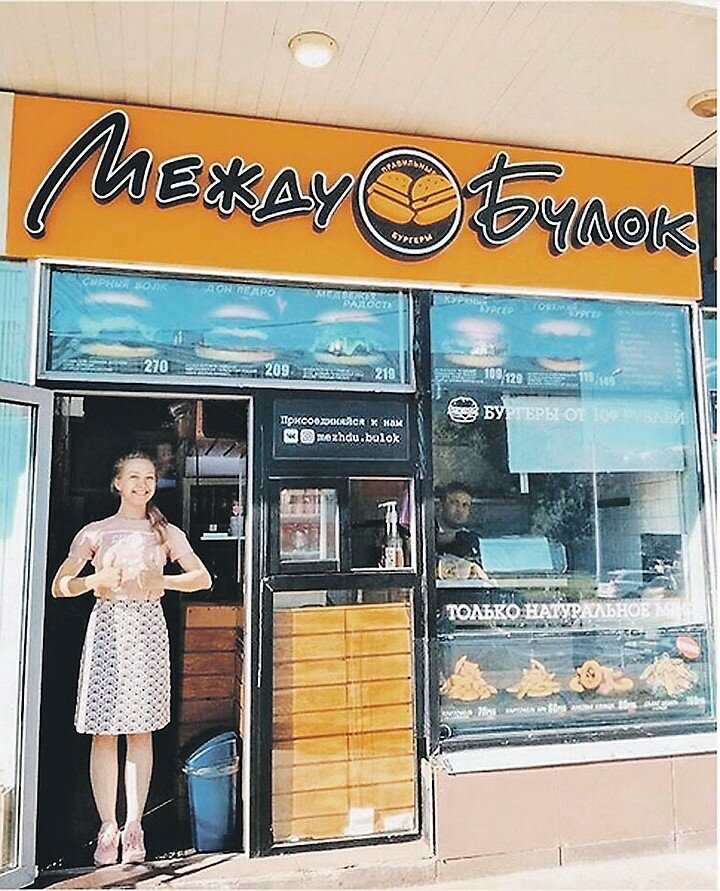 This is a portrait image with resolution 720x891, dominant color gray, approximately 5 main objects, containing 2 people.